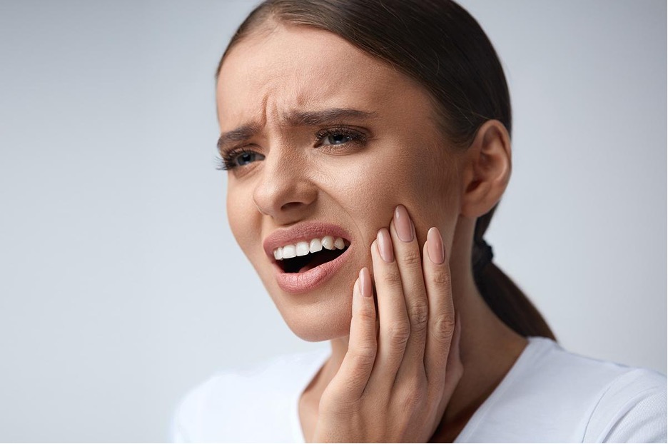 دلایل درد دندان بعد از کشیدن